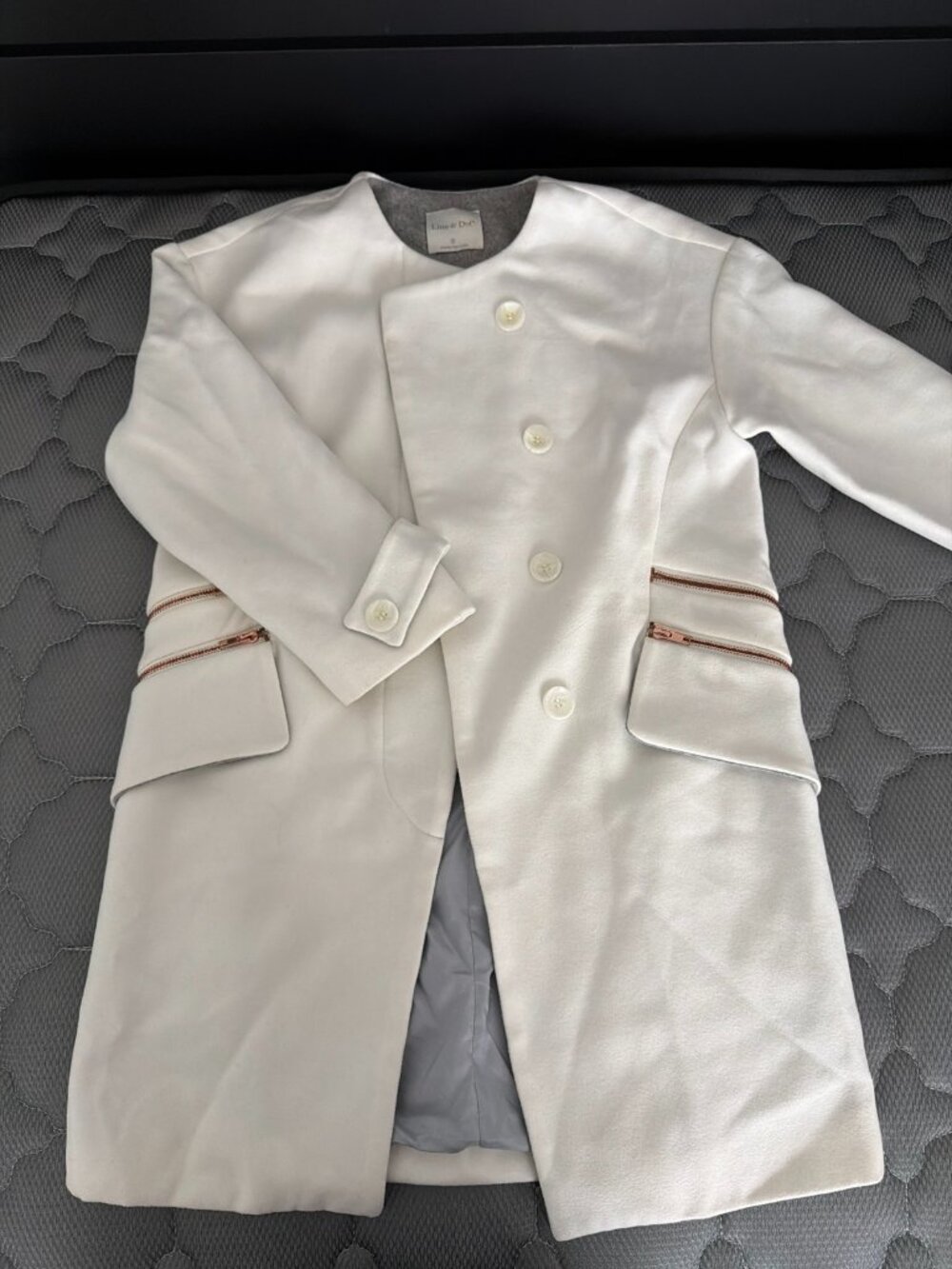 Line & Dot White Collarless Coat